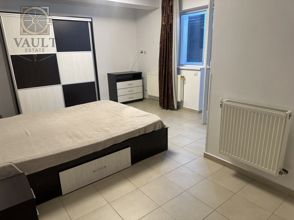 Imobil cu12 unitati-8 apartamente-2 garsoniere și 2 apartamente la mansardă 