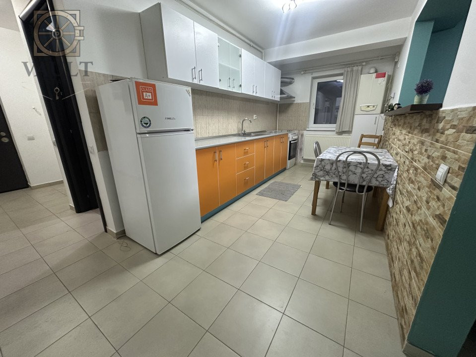 Imobil cu12 unitati-8 apartamente-2 garsoniere și 2 apartamente la mansardă 