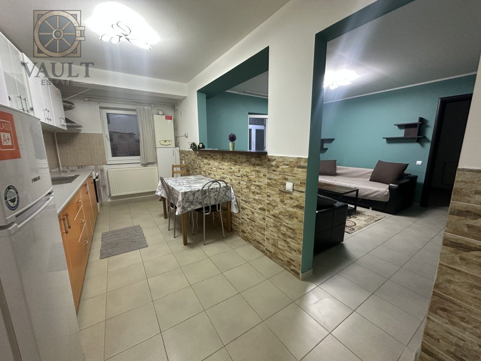 Imobil cu12 unitati-8 apartamente-2 garsoniere și 2 apartamente la mansardă 